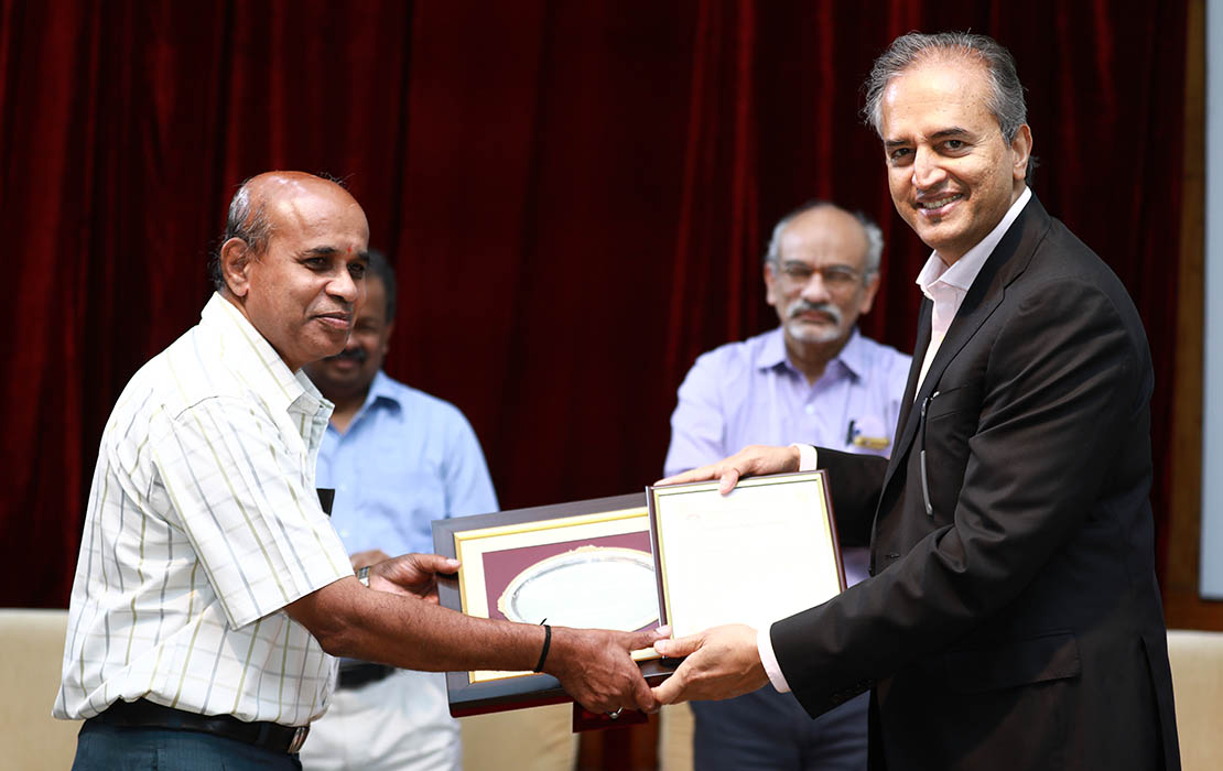 Another valued staff member Bhaskar Rao, on completing 40 years of service at IIM Bangalore.