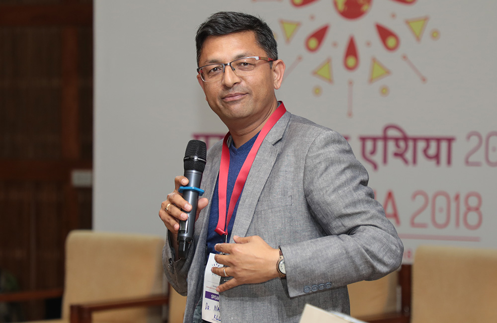 Nama Budhathoki, Executive Director, Kathmandu Living Labs, takes questions from the audience
