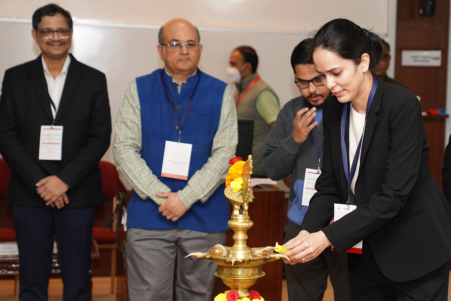 Inauguration ceremony of IMR Doctoral Conference (IMRDC) 2025 at IIM Bangalore, featuring keynote speakers and attendees.