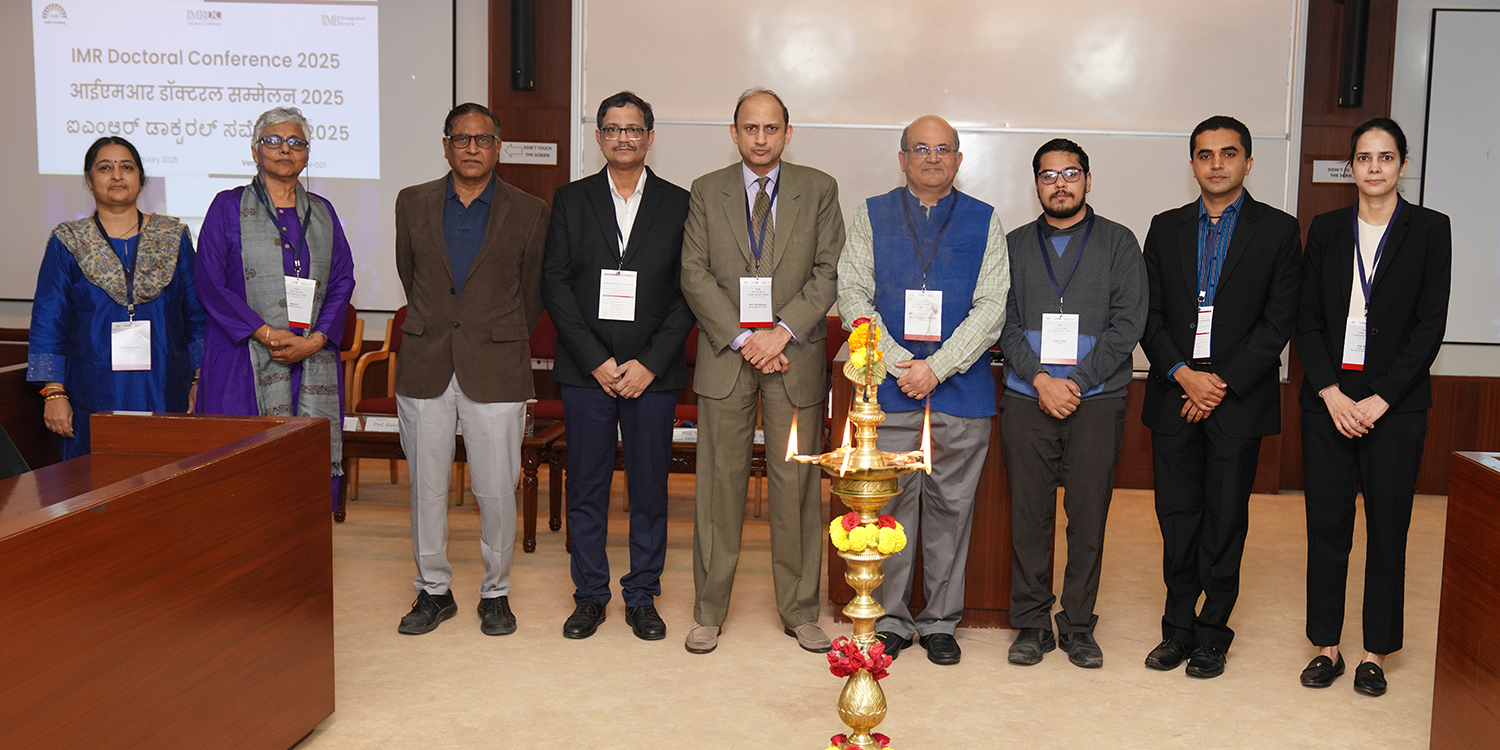 Inauguration ceremony of IMR Doctoral Conference (IMRDC) 2025 at IIM Bangalore, featuring keynote speakers and attendees.