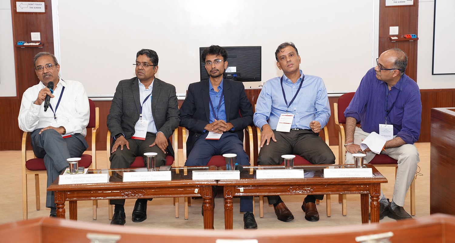 Presentation of the IMRDC 2025 Best Paper Award to the winning research scholar at IIM Bangalore