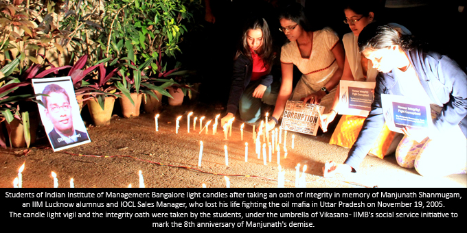 Students of Indian Institute of Management Bangalore light candles...