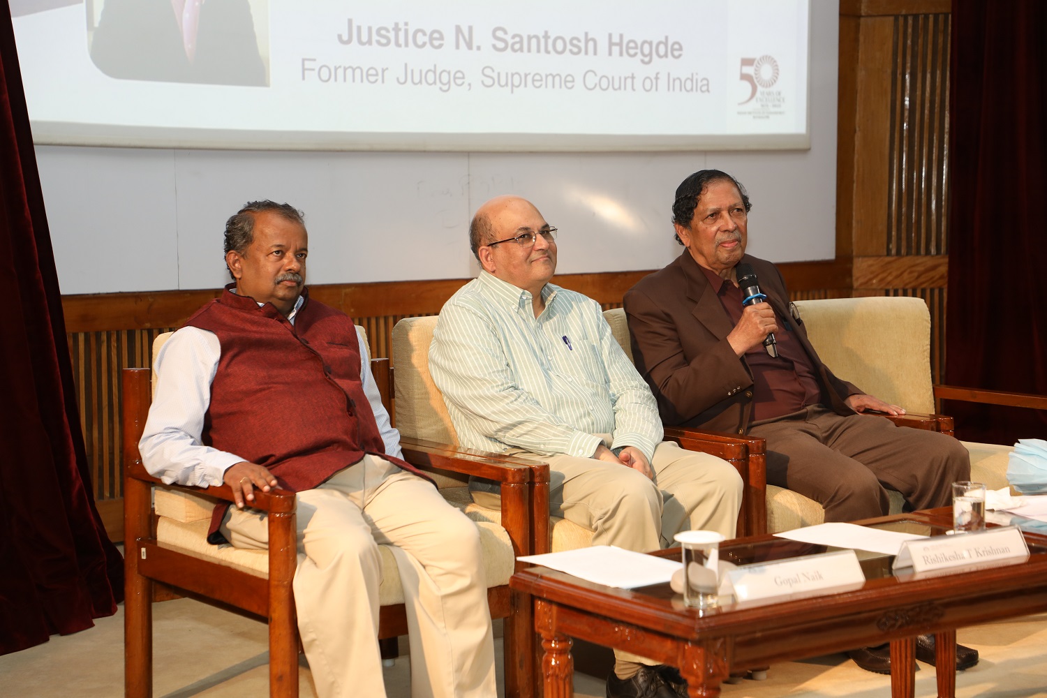 Justice N. Santosh Hegde, Former Judge, Supreme Court of India, during the Q&A session. Seen here with Prof. Rishikesha T Krishnan, Director, IIM Bangalore and Dr. Gopal Naik, Chairperson, Centre for Public Policy.