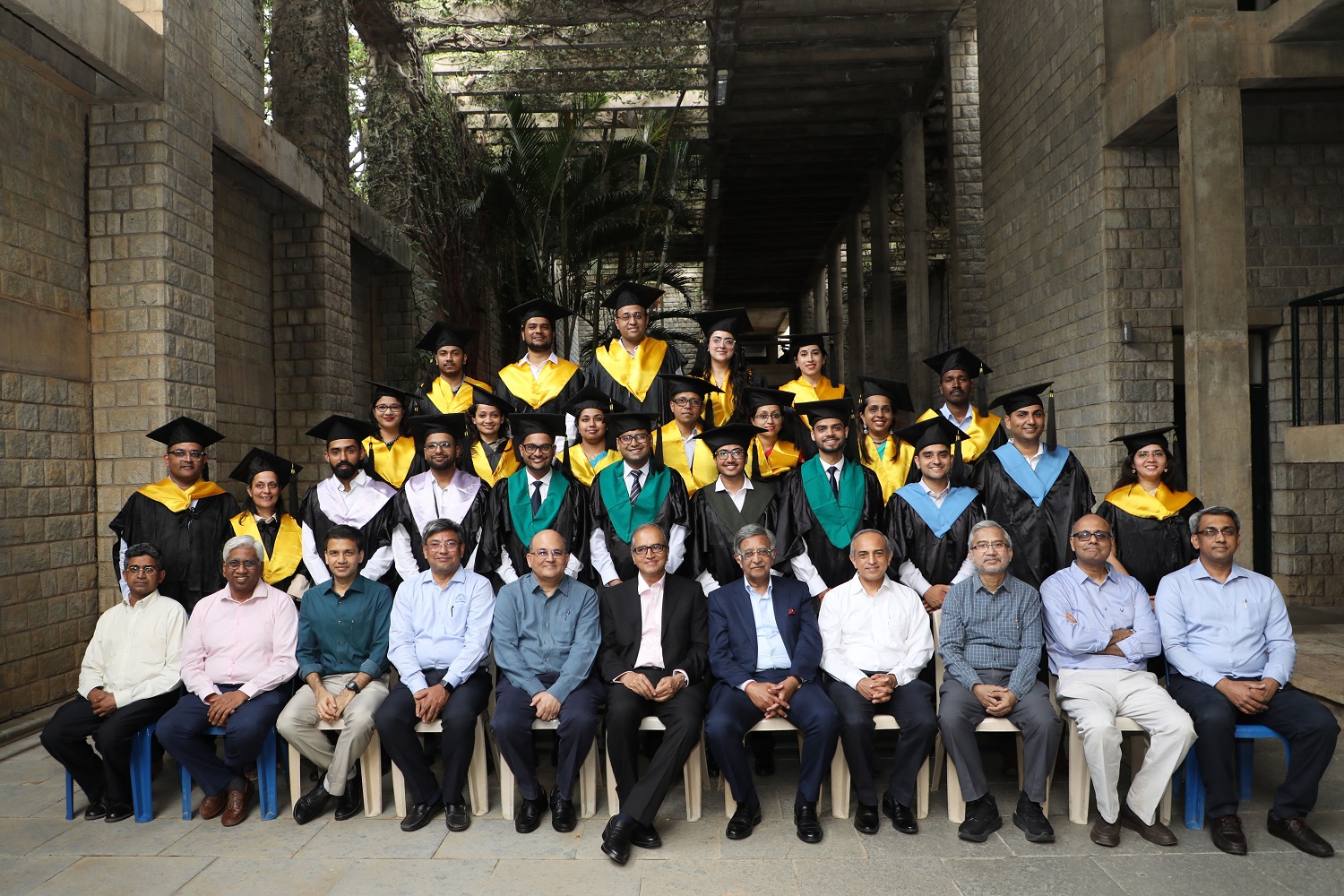 The Chairperson of the Board of Governors of IIMB, Director, IIMB, Deans, and Chairpersons of the degree-granting programmes  along with graduating PhD scholars and gold medal winners from all the programmes.