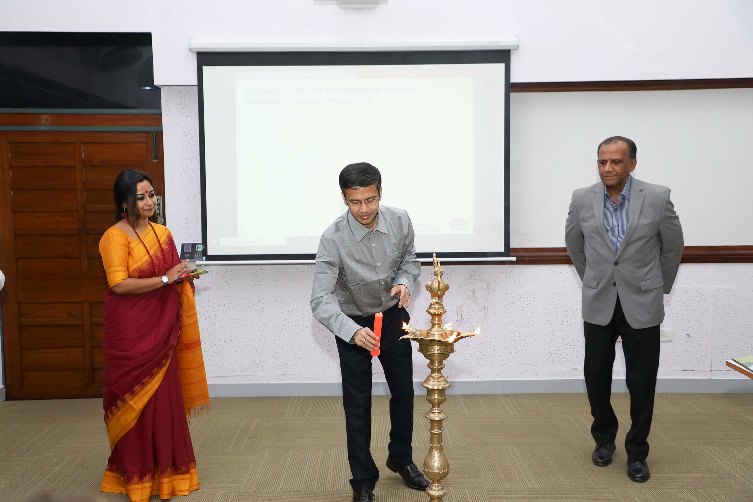 (From L to R): Lopamudra Dewan, Associate Manager at Centre for Teaching and Learning, IIMB; Prof. Sourav Mukherji, Dean, Alumni Relations & Development, and faculty in the OBHRM area of IIMB, and Dr. Arun Pereira, MIT-Sloan International Faculty Fellow, and Emeritus Faculty at the Richard A. Chaifetz School of Business, Saint Louis University, USA, inaugurate the second Doctoral Consortium on Teaching, held by IIMB’s Centre for Teaching and Learning, from 30th January to 2nd February 2023.