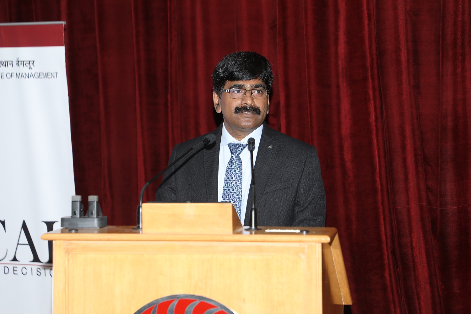 Dr. U Dinesh Kumar, Chairperson of the Data Centre and Analytics Lab at IIMB, delivers the welcome address.