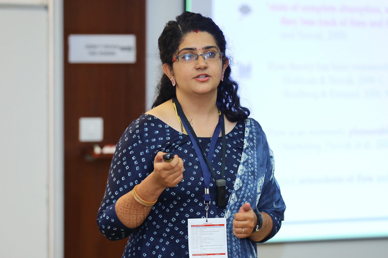 Aishwarya Ramesh, IIT Madras, presents her paper titled, ‘Designing chatbots for optimal user experience: Design cues and the routes’, at the IMR Doctoral Conference, at IIMB on 3rd February 2024.
