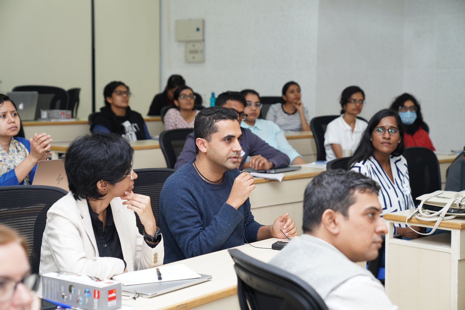 A glimpse of the audience engaging at the SEHAT workshop on mental health research.