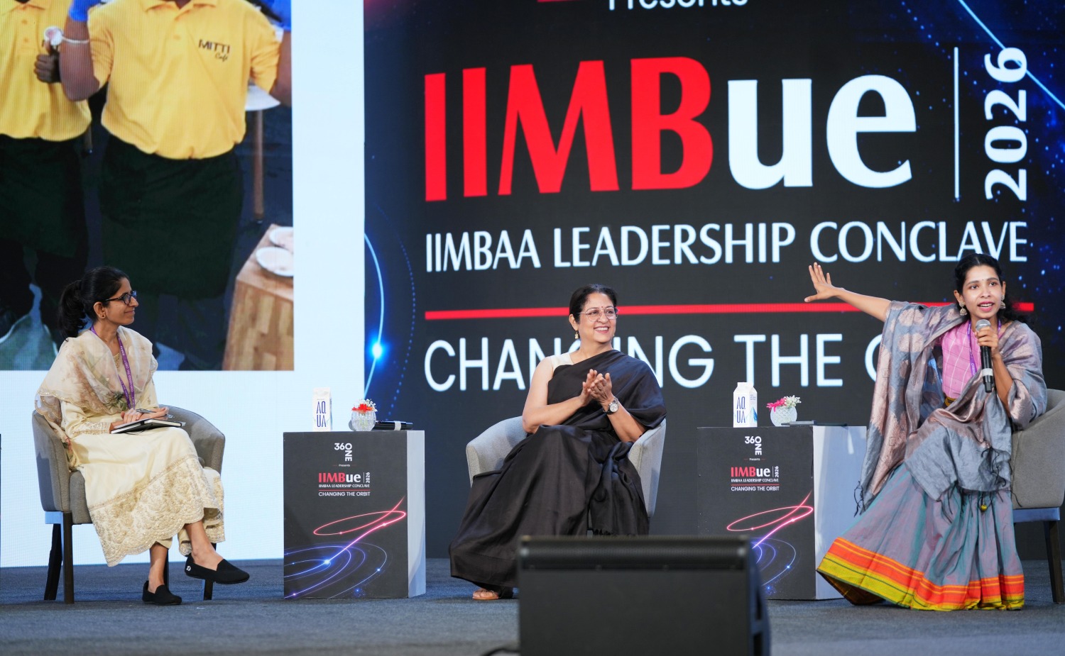 (L-R) Prof. Mukta Kulkarni, Dean, Programmes and Professor of OBHRM, moderates the opening panel discussion on Day 2 of IIMBue 2026, ‘Beyond Diversity: Humans in an Alien World’, featuring Safeena Husain, Founder, Educate Girls, and Alina Alam, Founder & CEO, MITTI Café.