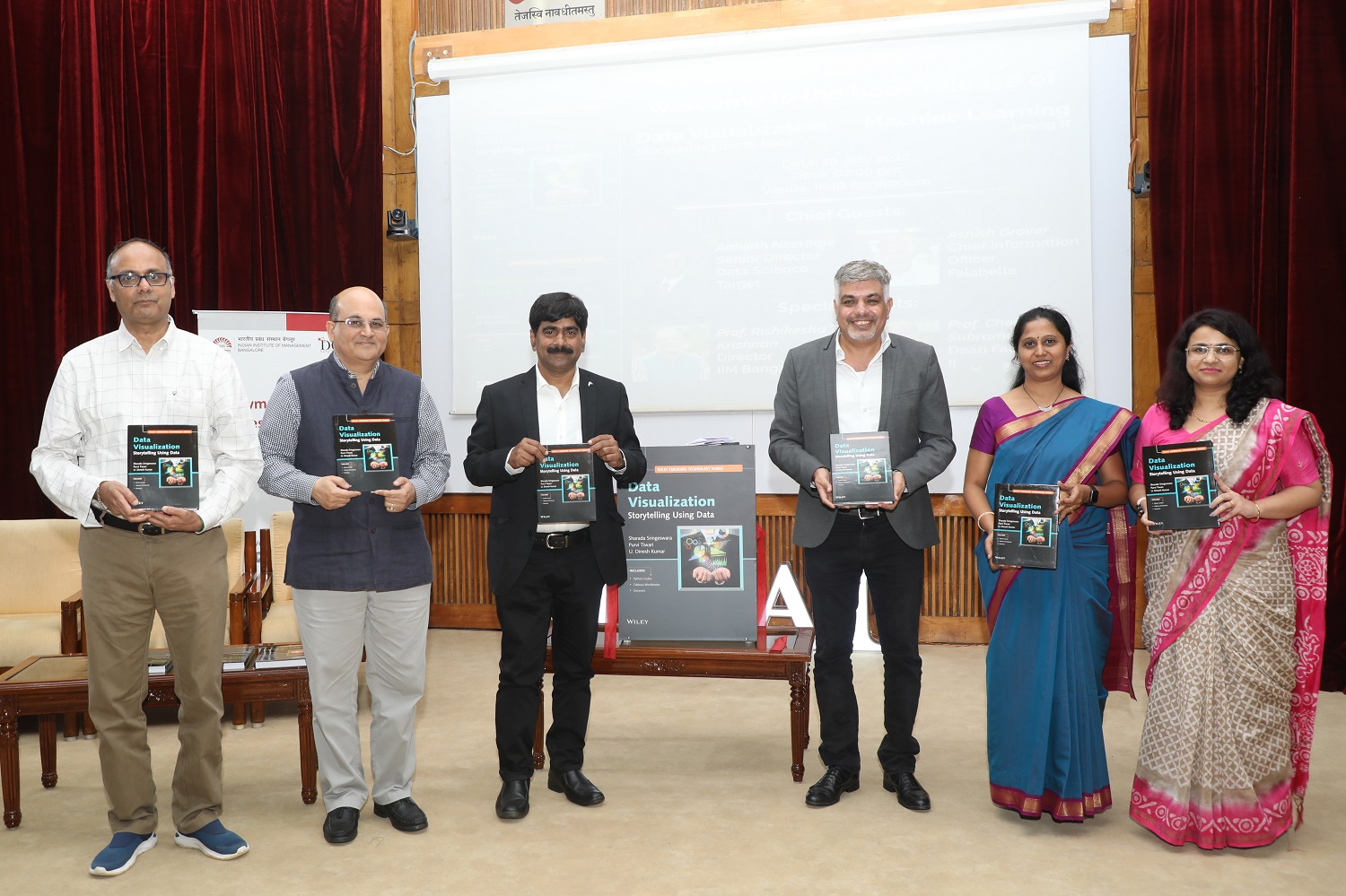 IIMB’s Data Centre and Analytics Lab hosts launch of the book ‘Data Visualization’ authored by Sharada Sringeswara, Research Consultant, DCAL, IIMB, Purvi Tiwari, Research Associate, IIMB and Prof. U Dinesh Kumar, faculty at IIMB and Chairperson, DCAL, on July 16, 2022. (L-R) Prof. Chetan Subramanian, Dean, Faculty, IIMB; Prof. Rishikesha T Krishnan, Director, IIMB; Prof. U Dinesh Kumar; Ashish Grover, Chief Information Officer, Falabella; Sharada Sringeswara and Purvi Tiwari.