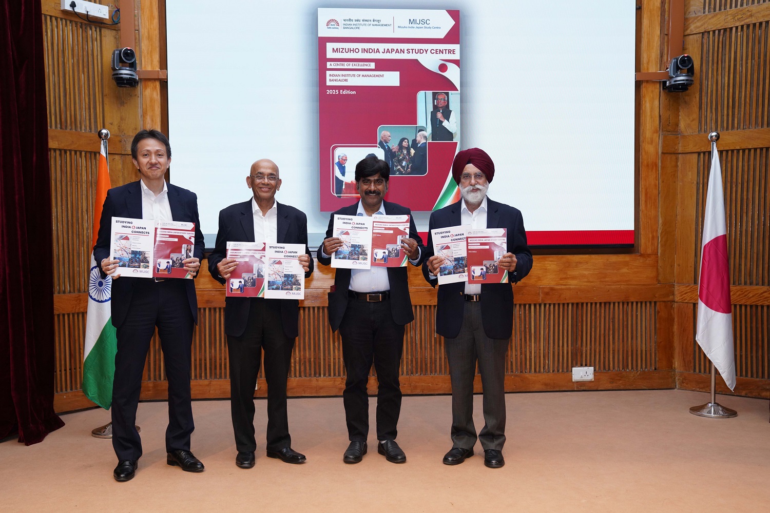 L–R: Mr. Yoshikazu Yamada, Head, Corporate Banking Department, Mizuho Bank (Bangalore branch); Mr. Saideep Rathnam, COO, MIJSC; Prof. Dinesh Kumar, Director In-charge, IIMB; and Mr. Sandeep Singh, MD, Tata Hitachi Construction Machinery, at the release of the MIJSC Brochure 2025.