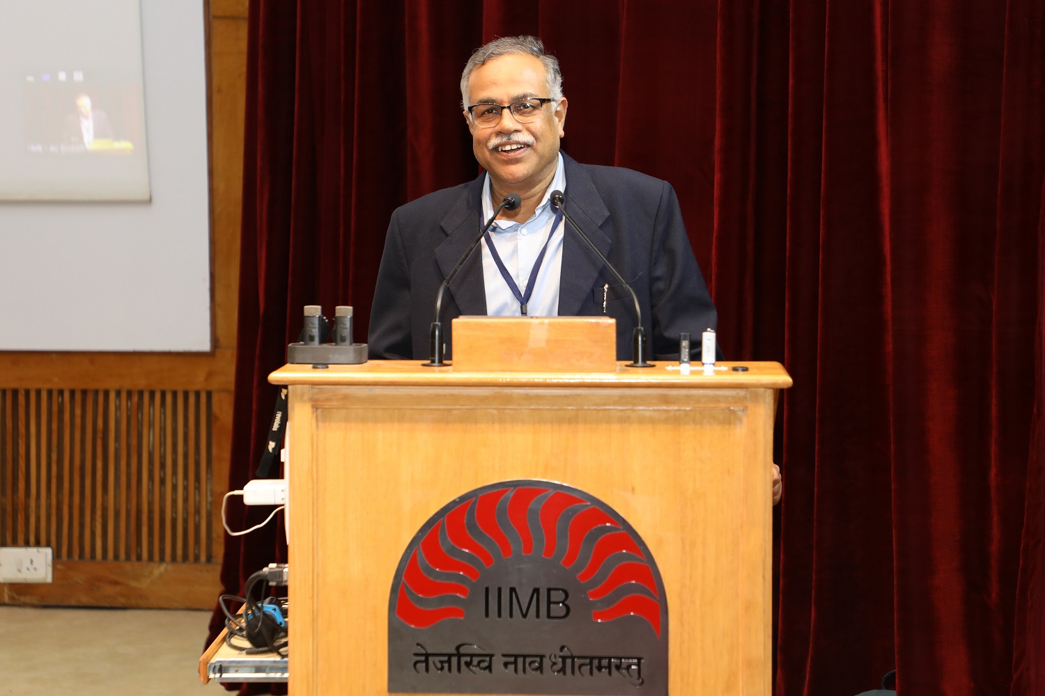 Prof. M Jayadev, Chairperson, Centre for Capital Markets and Risk Management, IIMB, introduces the keynote speaker to the audience.