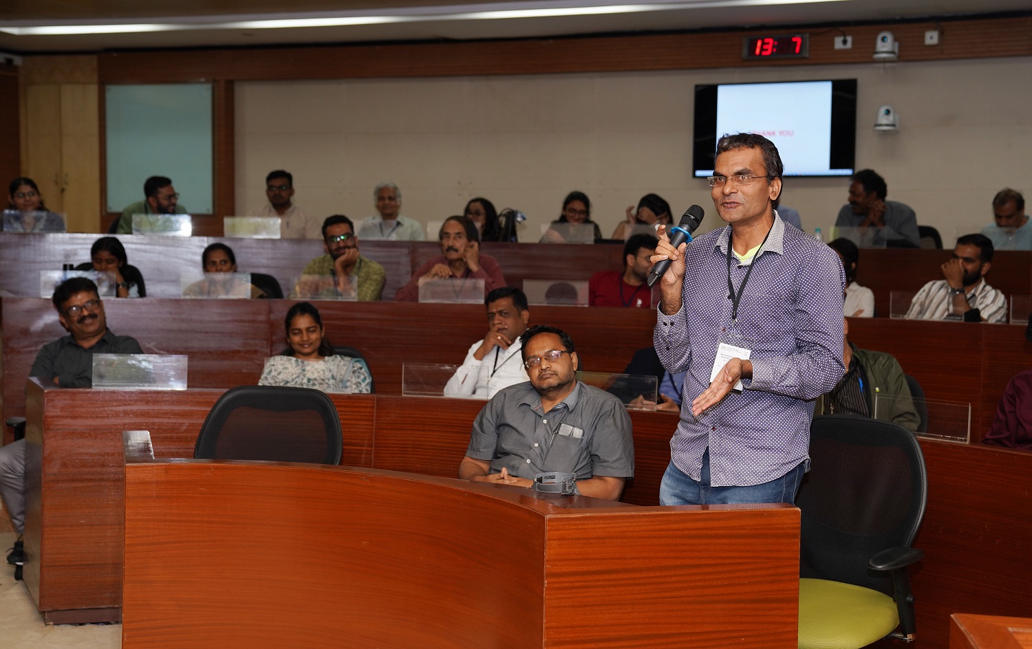 Participants interact with S. Mahendra Dev, after his talk.