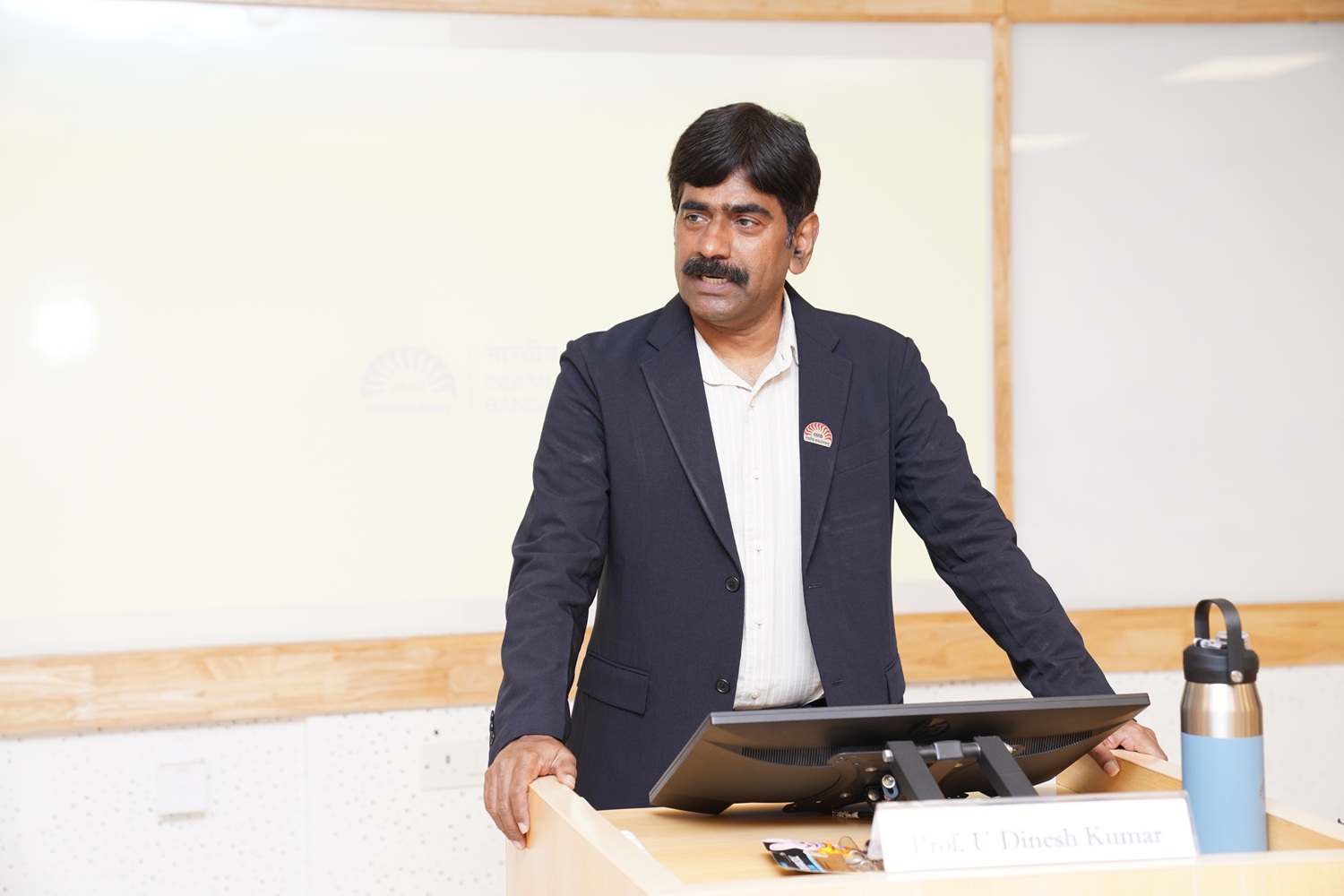 Professor U. Dinesh Kumar, Director-in-charge, Chairperson, Data Centre and Analytics Lab (DCAL), and faculty in the Decision Sciences area delivers a session on Analytics, Artificial Intelligence (AI), and Generative Artificial Intelligence (GenAI) as part of the session.
