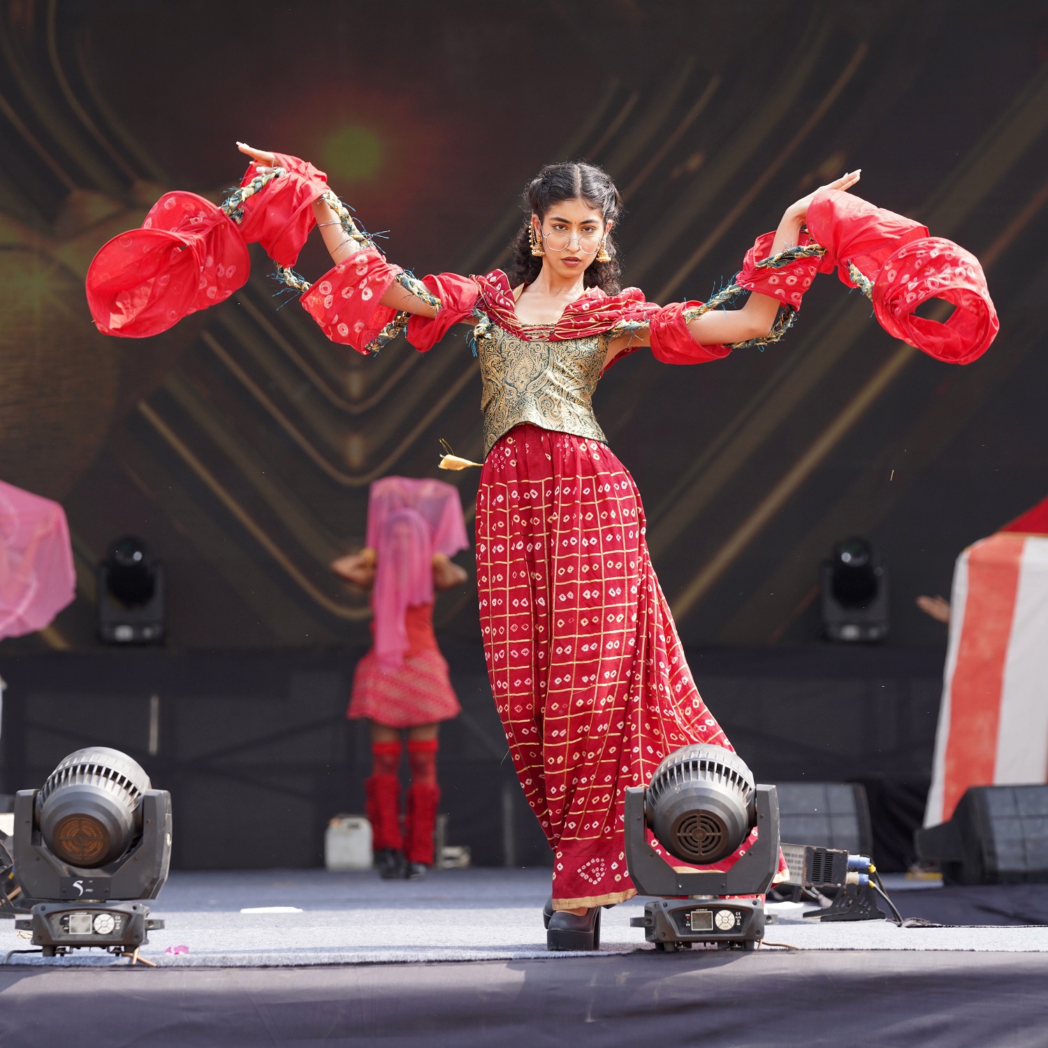 A Participant while presenting her performance-led fashion narratives during Haute Couture