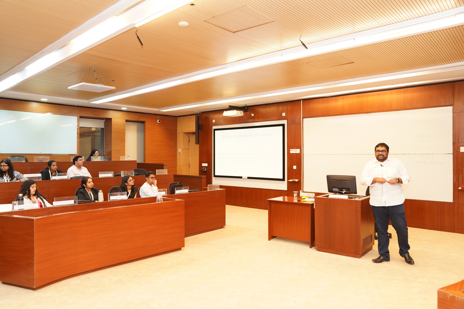 Anirudh S, Strategy area, delivers a session on ‘profitability in a capitalist system’, during the sessions conducted by IIM Bangalore’s senior doctoral scholars.