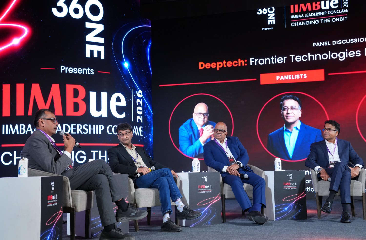 (L-R) Rajiv Raghunandan, PGP 2000, Managing Partner, Arali Ventures, moderates a discussion with Ashok Atluri, Chairman & MD, Zen Technologies Ltd.; Anand Ramamoorthy, Founding MD, Micron Technology India; and Dr. Sandeep Kumar, CEO, L&T Semiconductor Technologies, on India's deep-tech ambitions and the future of innovation. 