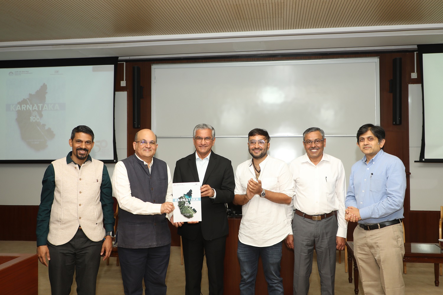 (L-R) Prof. Jitamitra Desai, co-author of the report and faculty, Decision Sciences area, IIMB; Prof. Rishikesha T Krishnan, Director, IIMB; Mr Ramesh Ramadurai, Managing Director, 3M India Ltd, and former Chairman, CII Karnataka State Council; Prof. Prateek Raj, co-author of the report and faculty, Strategy area; Prof. Shanker Subramoney, co-author of the report and faculty, Finance & Accounting area, IIMB and Prof. Anil B Suraj, co-author of the report and faculty, Public Policy area, IIMB.