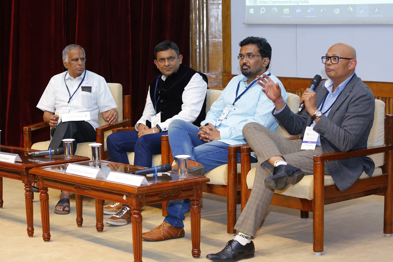 Prof. S. Sadagopan moderates the panel discussion on, 'Emergence and Sustainability of Non-AI Solutions in AI World'. (L-R) Prof. S. Sadagopan; Srivatsan Santhanam, VP, Spend Management, SAP; SatyaKrishna Pillarishetty, Principal PM, Oracle Health and AI, and Anand Srivastava, Head Products, Genesys.