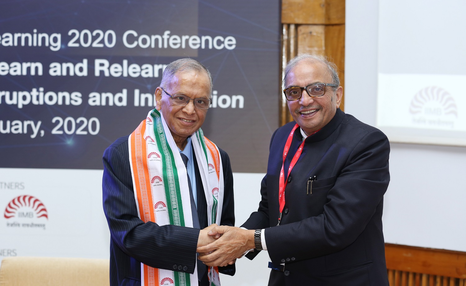 Prof. Deepak B Phatak, Conference Co-Chair, IIT-Bombay, welcomes N R Narayana Murthy, Chairman Emeritus and Co-Founder, Infosys to the conference. 