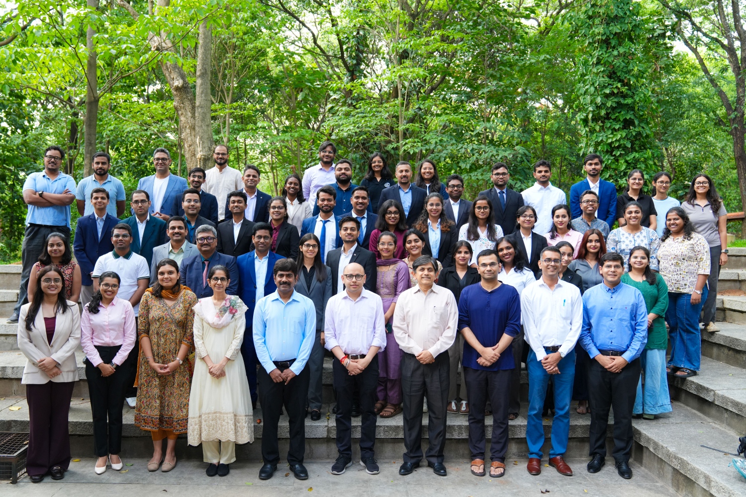 A snapshot of the incoming PhD scholars and N.S. Ramaswamy Pre-doctoral Fellows alongside faculty members and doctoral scholars during the inauguration ceremony at IIM Bangalore.