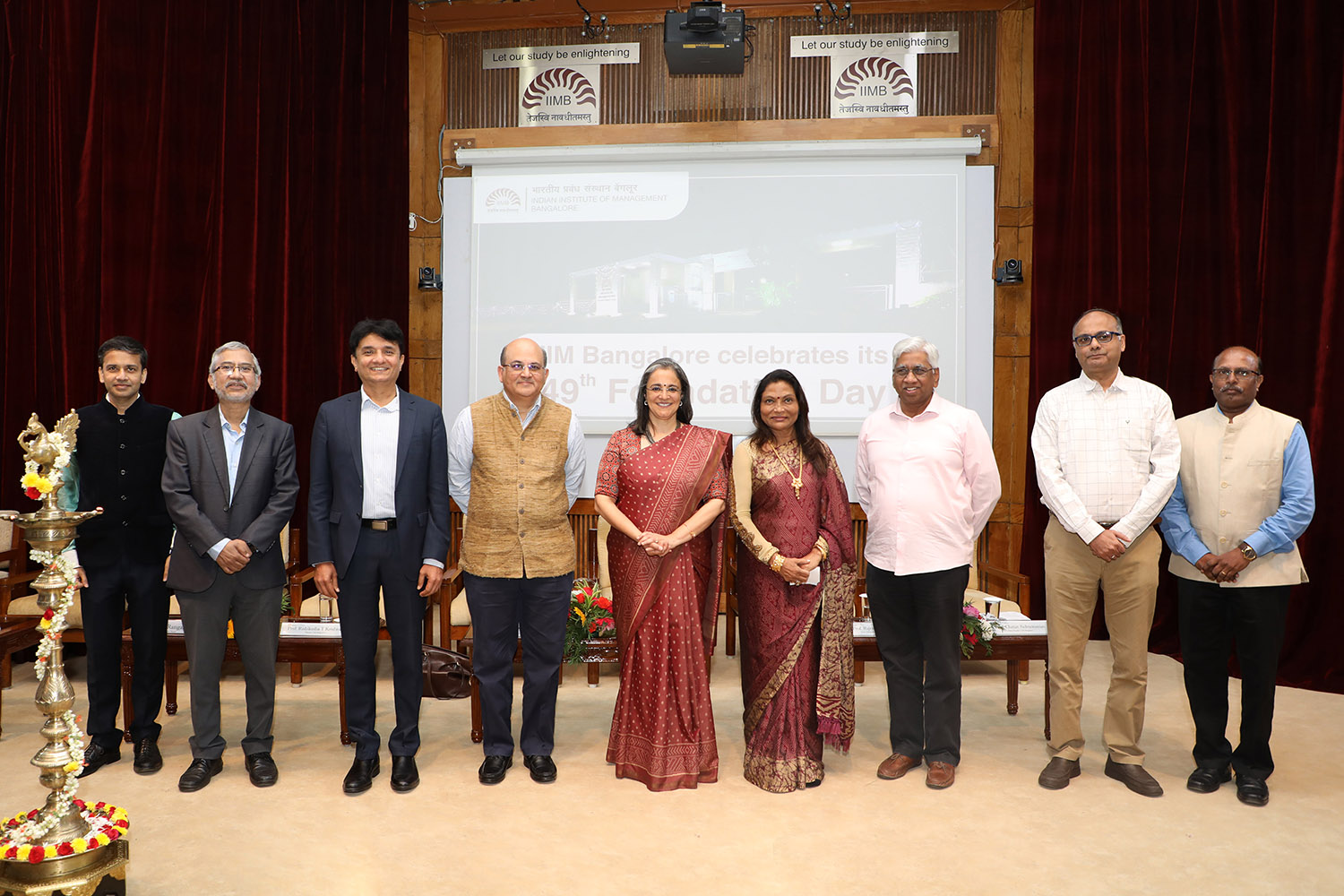 (L-R) Prof. Sourav Mukherji, Dean, Alumni Relations & Development, IIMB; Prof. Rahul Dé, Dean, Programmes, IIMB; Mr M. D. Ranganath, Member of the Board of Governors, IIMB; Prof. Rishikesha T Krishnan, Director, IIMB; Ms Madhabi Puri-Buch, Chairperson, Securities and Exchange Board of India (SEBI); Ms. Kalpana Saroj, Member of the Board of Governors, IIMB; Prof. Rajendra K Bandi, Dean, Administration, IIMB; Prof. Chetan Subramanian, Dean, Faculty, IIMB; Col. (Retd.) S.D. Aravendan, Chief Administrative Officer, IIMB.