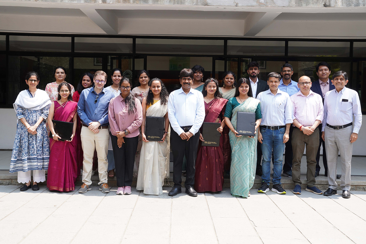The outgoing batch of the NSR Pre-doc programme with Prof. Dinesh Kumar, Director-in-charge, IIMB, deans and senior faculty of the Institute at the valedictory ceremony of the 2025-26 cohort of the NSR Pre-doc programme.