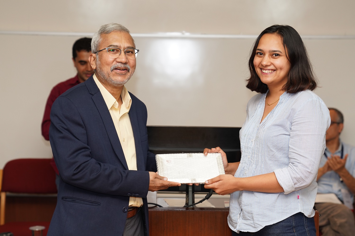 Anshika Mathur, Shiv Nadar University, receives the IMRDC 2024 Best Paper Award for her paper titled, ‘Money matters: Evidence from a conditional cash transfer scheme on child and maternal health’ from Professor Rahul Dé, Dean, Programmes, IIMB.
