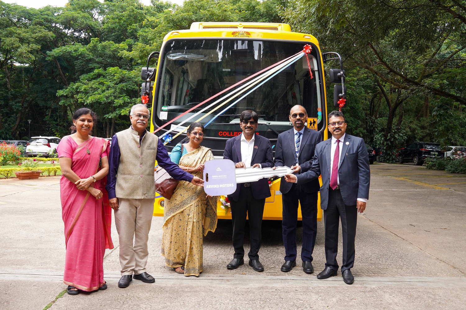 (L-R) Prof. Haritha Saranga, Chairperson, Sustainability Taskforce, IIMB; Prof. M. Jayadev, Dean Administration, IIMB; Smt. Nivedita E.P., Executive Director, NeSL; Prof. U Dinesh Kumar, Director In-charge, IIMB; Shri. Debajyoti Ray Chaudhuri, MD & CEO, NeSL; Shri. Bhavendra Kumar, Executive Director, Canara Bank, inaugurated an EV bus on the IIMB campus during a flagging off ceremony on 24 October 2025.