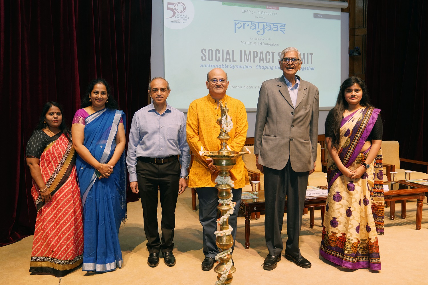 Prof. Ashok Thampy, Chairperson, Executive Post Graduate Programme in Management, and faculty of the Finance & Accounting area of IIM Bangalore, Prof. Rishikesha T Krishnan, Director, IIM Bangalore, D R Mehta, former Chairman, SEBI, and Founder and Chief Patron of Bhagwan Mahaveer Viklang Sahayata Samiti and others inaugurate the social impact summit, ‘Sustainable Synergies – Shaping the Future Together’, on 18th February 2024, as part of Prayaas Day 2024, at IIMB. Prayaas is the social responsibility initiative of EPGP, which is aligned to IIMB’s ethos of building socially responsible leaders.