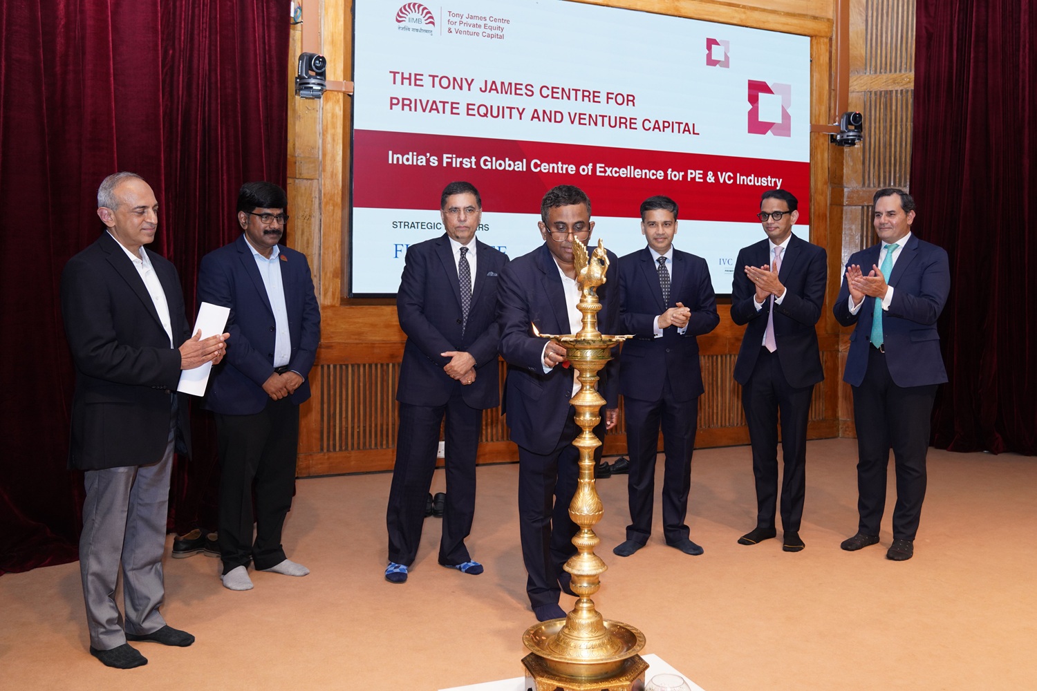 (L-R) Prof. Ashok Thampy, Florintree Chair Professor for Private Equity & Venture Capital; Prof. Dinesh Kumar, Director In-charge, IIMB; Mr. Sanjiv Mehta, Executive Chairman, L Catterton India; Mr. Mathew Cyriac, PGP ’94, Executive Chairman, Florintree Advisors; Prof.  Sourav Mukherji, Professor, Dean, Faculty & Dean, Alumni Relations & Development; Mr. Amit Jain, MD and Head of Carlyle India, and Mr. Vivek Pandit, Senior Partner and Global Co-Leader Private Equity, McKinsey & Co., inaugurated the launch of the Tony James Centre for PE & VC on 6 August 2025.