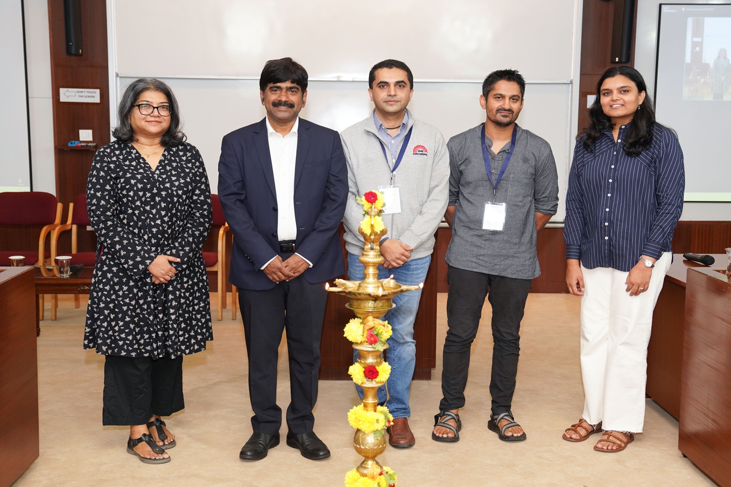 Prof. U Dinesh Kumar, Director In-charge, IIM Bangalore, Prof. Aditya Shrinivas, faculty of the Economics area of IIMB, the keynote speaker Prof. Arun Chandrasekhar of Stanford University, and Prof. Anubha Agarwal of the Economics area of IIMB, during the inauguration of the ‘Symposium on Network Economics’ at IIM Bangalore, on 29th August 2025.