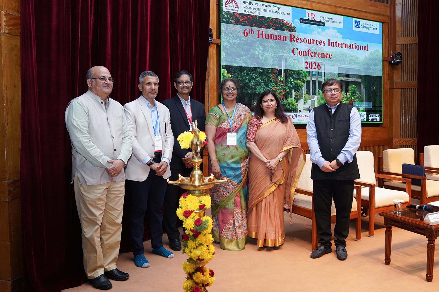 L-R: Prof. Rishikesha T Krishnan, Professor In-charge, New Campus and faculty of the Strategy area, IIMB; Prof. Pawan Budhwar, Aston University, UK; Prof. Sushanta K Mishra, Chairperson, Research & Publications, C-DOCTA and Centre for Teaching & Learning, Editor-in-Chief, IIMB Management Review, and faculty of the Organizational Behavior & Human Resources Management area, IIMB; Prof. Vasanthi Srinivasan, Dean, Alumni Relations & Development and faculty of the Organizational Behavior & Human Resources Management area, IIMB; Swapna Bapat (Tanmatra – Women in Leadership Programme alumna), MD and VP – India and SAARC, Palo Alto Networks, and Saugata Gupta (PGP 1991 alumnus), Managing Director and Chief Executive Officer, Marico Limited, on Day One of the sixth Human Resources International Conference, organized by the Human Resources Division of the Academy of Management, being held at IIM Bangalore from 9th to 11th April 2026.