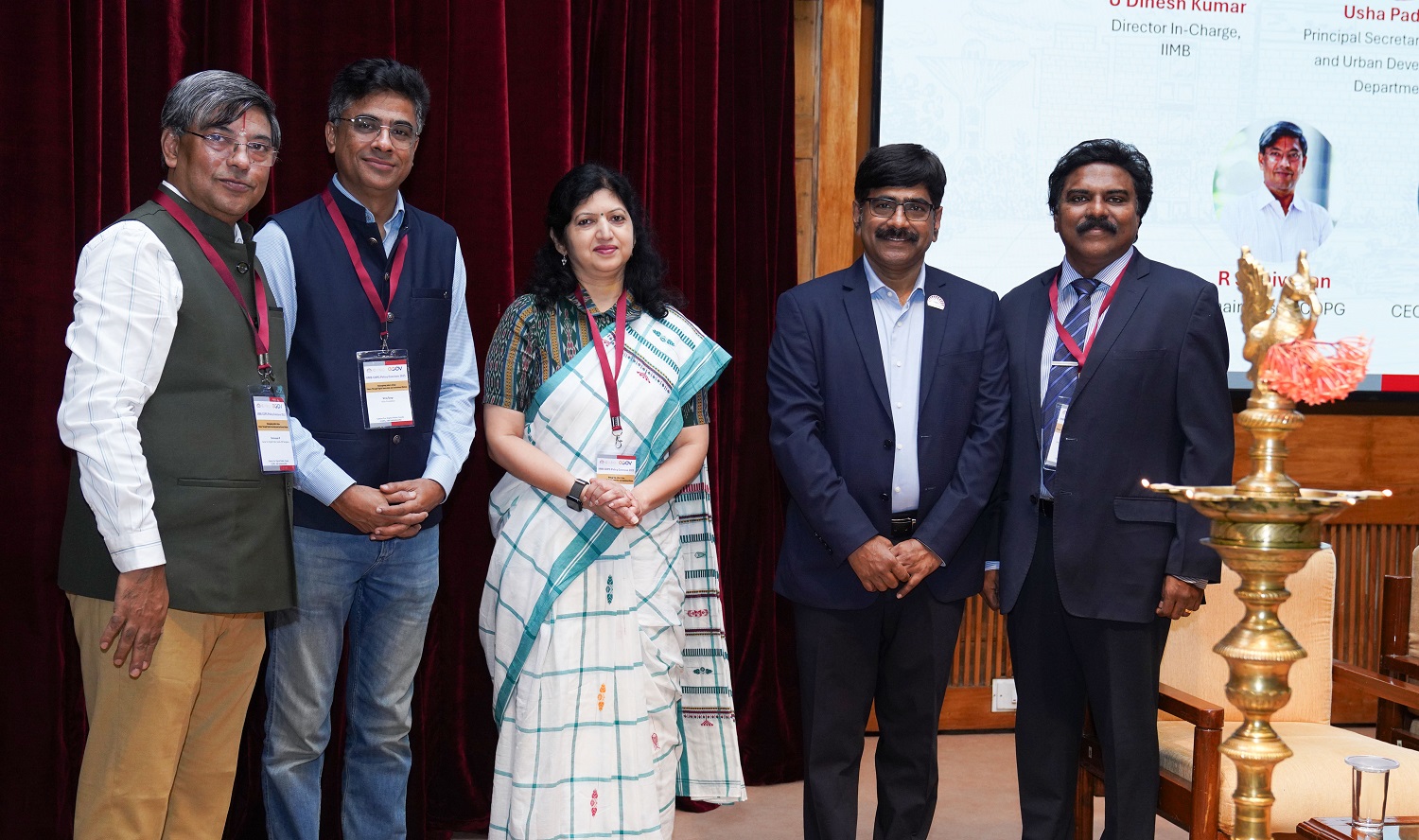(L-R) Prof. R. Srinivasan, Chairperson, CDPG, IIMB; Viraj Tyagi, CEO, eGov Foundation; Usha Padhee, Principal Secretary, Housing and Urban Development Department, Government of Odisha; Prof. U. Dinesh Kumar, Director In-charge, IIMB; and Dr. Santhosh Babu, Chief Mission Director, Information Kerala Mission, Government of Kerala, formally inaugurated the annual Policy Conclave 2025, under the theme ‘Reimagining India's Urban Future Through Digital Innovation and Institutional Reform’, hosted by the  Centre for Digital Public Goods (CDPG) at IIMB and eGov Foundation.