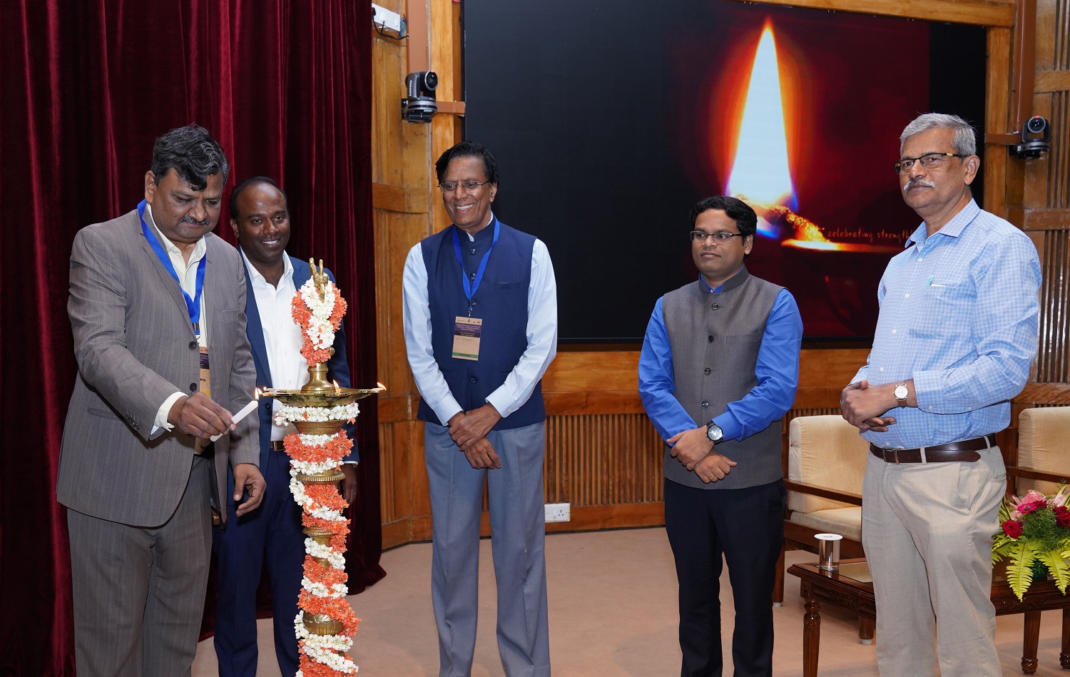 (L-R) Dr. Aditya Gupta, Chief Operating Officer, Supply Chain Management Centre (SCMC), IIMB; Shridhar Rajappanavar, Founder & CEO, Key Sustainability Solutions Private Limited; Dr. S Devarajan, former President, BCIC and Sr VP, TVS Motors; Prof. Rajeev R. Tripathi, Chairperson, SCMC, IIMB; and Mahesh T, Director, Environmental Management and Policy Research Institute (EMPRI), Government of Karnataka, inaugurated the Sustainability & Material Compliance Conference, organized by the TCI-IIMB Supply Chain Sustainability Lab at IIMB, in partnership with Key Sustainability Solutions Private Limited, Bangalore Chamber of Industry and Commerce (BCIC), and EMPRI, with the lighting of the lamp, on 26 September 2025.