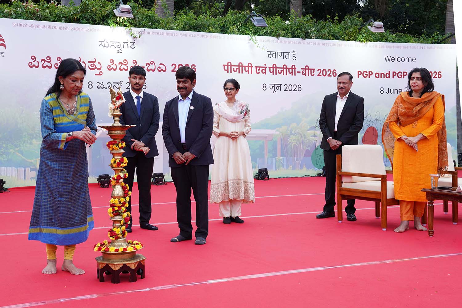 Padma Bhushan awardee Dr. Mallika Sarabhai (Chief Guest); Prof. U Dinesh Kumar, Director-in-charge, IIM Bangalore; Prof. Mukta Kulkarni, Dean, Programmes, Chairperson, Office of International Affairs, and faculty of the Organizational Behavior & Human Resources Management area; and Prof. Manaswini Bhalla, Chairperson, Post Graduate Programme in Management and PGP in Business Analytics, and faculty of the Economics area, during the inauguration of the Post Graduate Programme in Management and the Post Graduate Programme in Business Analytics, 2026-2028 batch, on 8th June 2026.  