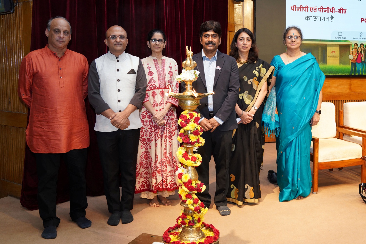 (L-R) Arun Pai, PGP 1993, Dipesh Shah, PGSEM 2002; Prof. Mukta Kulkarni, Dean, Programmes; Prof. U. Dinesh Kumar, Director-in-charge, IIM Bangalore; Rashmi Mohanty, PGP 1995; and Prof. Vasanthi Srinivasan, Dean, Alumni Relations & Development, IIM Bangalore; participate in the ceremonial lamp lighting to inaugurate the PGP & PGPBA reorientation ceremony and Distinguished Alumni Awards 2026 on 14 June 2026.