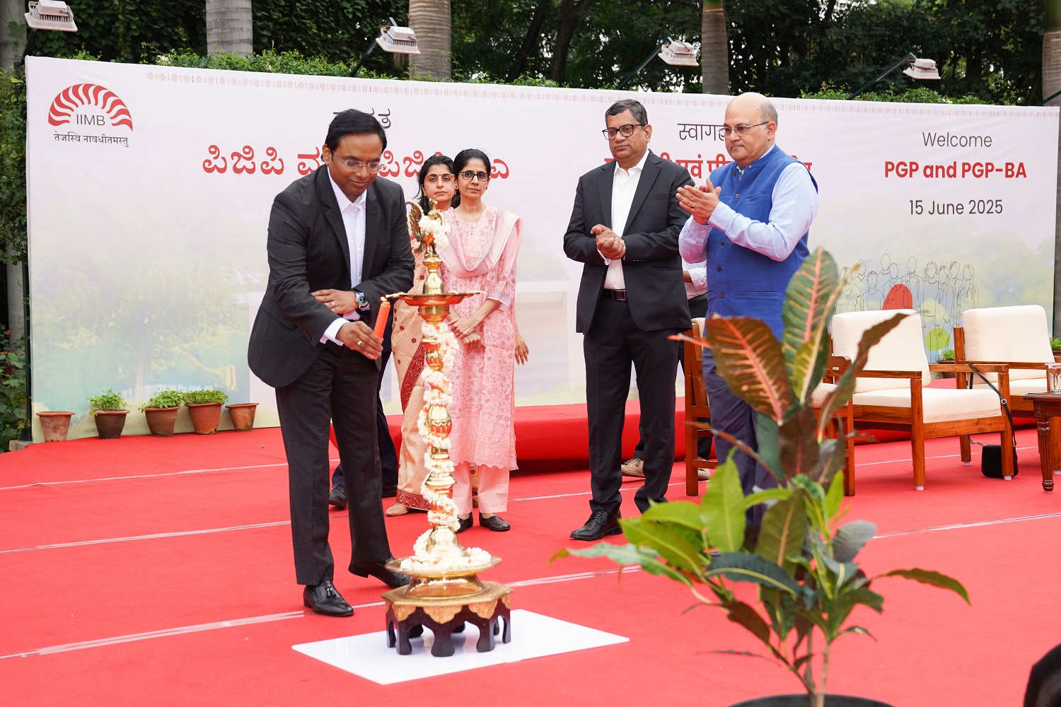 Mr. Raghu Polisetty, Senior Managing Director and Global Lead at Accenture Strategy & Consulting lights the ceremonial lamp during the closing ceremony of the PGP & PGP-BA Batch of 2025-2027 at IIMB on June 15, 2025.