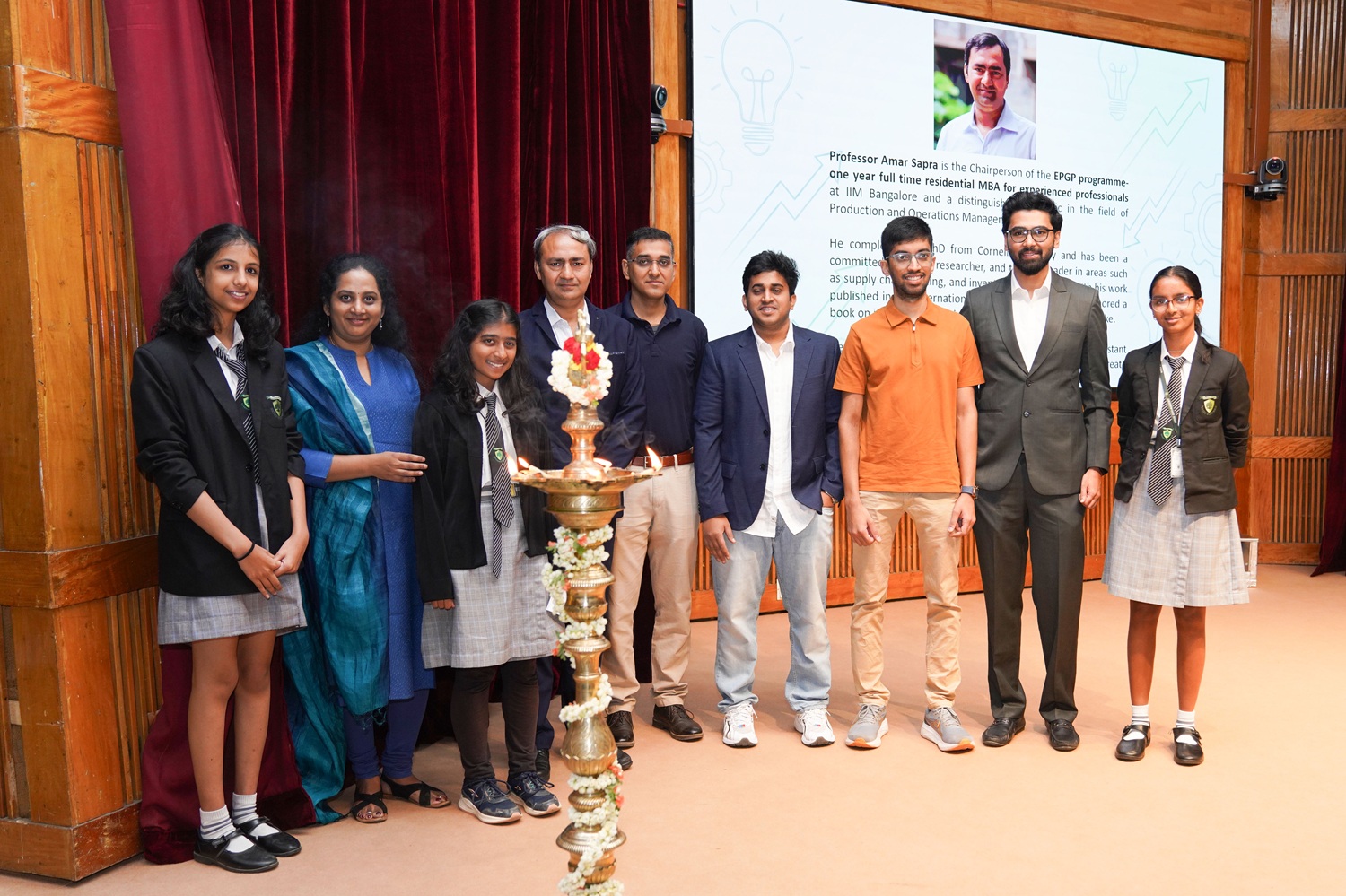 Ceremonial lamp lighting by Prof. Amar Sapra, Chairperson, EPGP, IIM Bangalore; jury members Mr. Debashish Chandel, Entrepreneur and EPGP ‘26; Mr. Naman Pandey, Head of Investments, Nucleo; and Mr. Saketh Ramakrishna, Founder, Quick Alpha, and Co-founder, Optionables FinTech LLP., along with Ms. Vanitha Anand, Member, EPGP Office; Rajasilpi S.P., EPGP ’26; and finalists of the Youth Udyami 2026 Grand Finale.