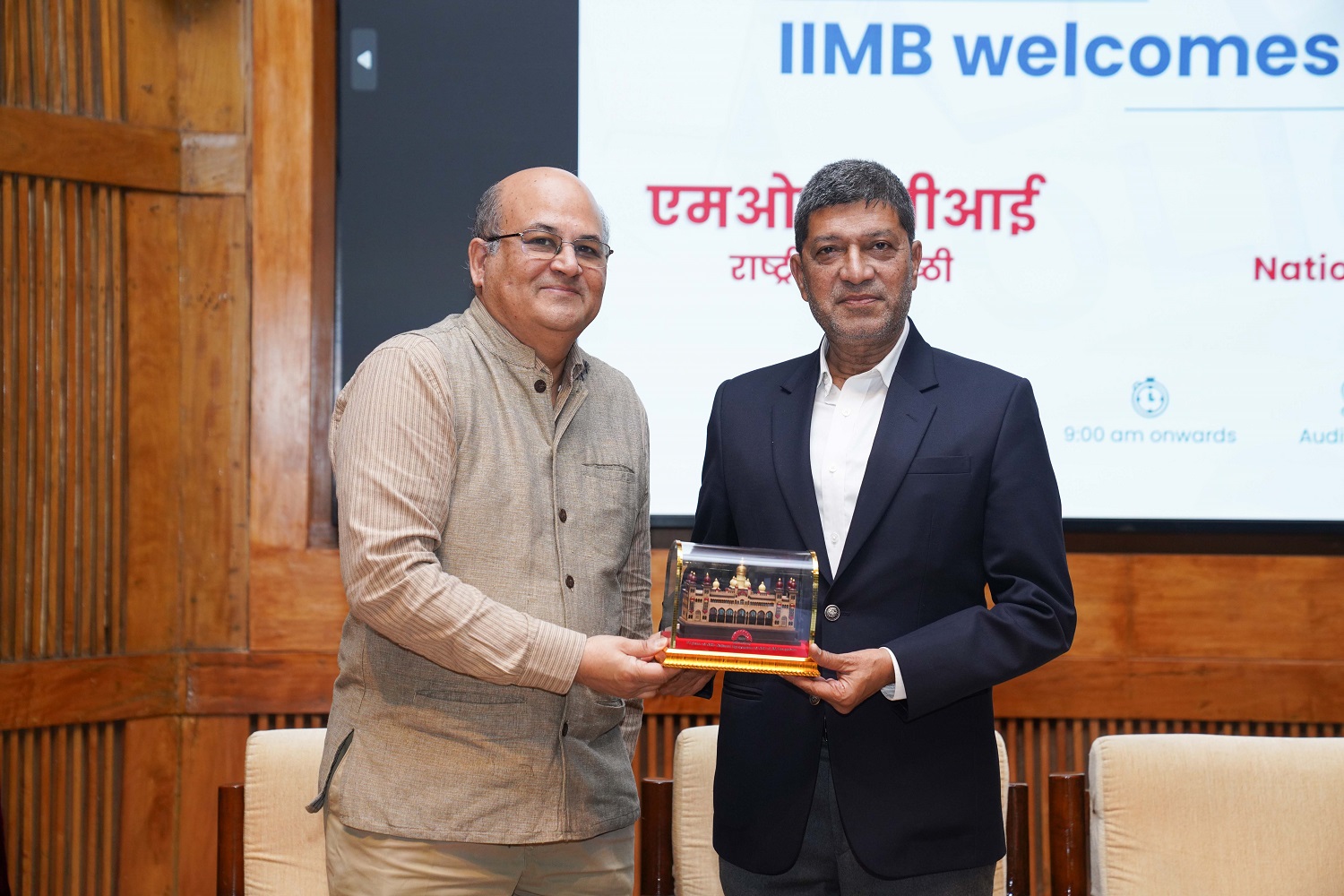 Prof. Rishikesha T. Krishnan felicitates Dr. Ashok Dalwai.