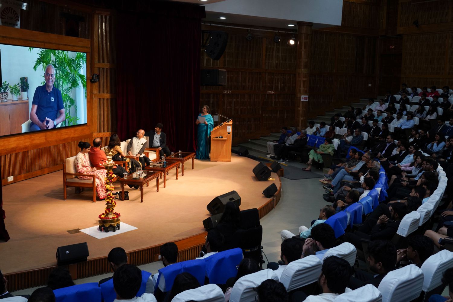 Manish Tiwary, PGP 1995, Chairman & Managing Director, Nestlé India, and Market Head, Nestlé South Asia Region, addresses the gathering virtually after receiving the DAA 2026, reflecting on the lasting impact of his IIM Bangalore education and reaffirming his commitment to giving back to his alma mater.
