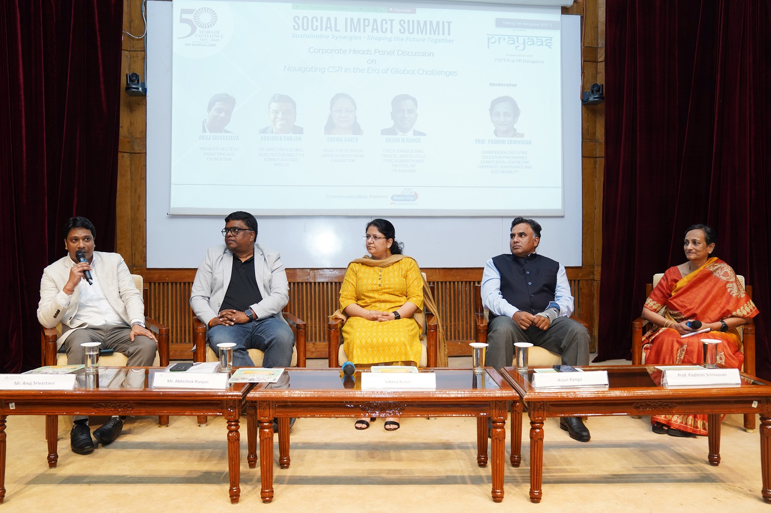 Prof. Padmini Srinivasan, Chairperson of the Centre for Corporate Governance & Sustainability and Executive Education Programmes and faculty of the Finance & Accounting area, IIMB, moderates the panel discussion on ‘Sustainable Synergies: Navigating CSR in the Era of Global Challenges’. (L-R): Anuj Srivastava, Manager, HCLTech Grant, HCL Foundation; Abhishek Ranjan, Senior Director & Global Head, Sustainability & Admin/Facilities, Brillio; Sakina Baker, Head, CSR, Bosch Limited and Bosch India Foundation; Arjun M Ranga, CMD, N. Ranga Rao & Sons Private Limited, Cycle Pure Agarbathi and Trustee, NR Foundation, and Prof. Padmini Srinivasan.