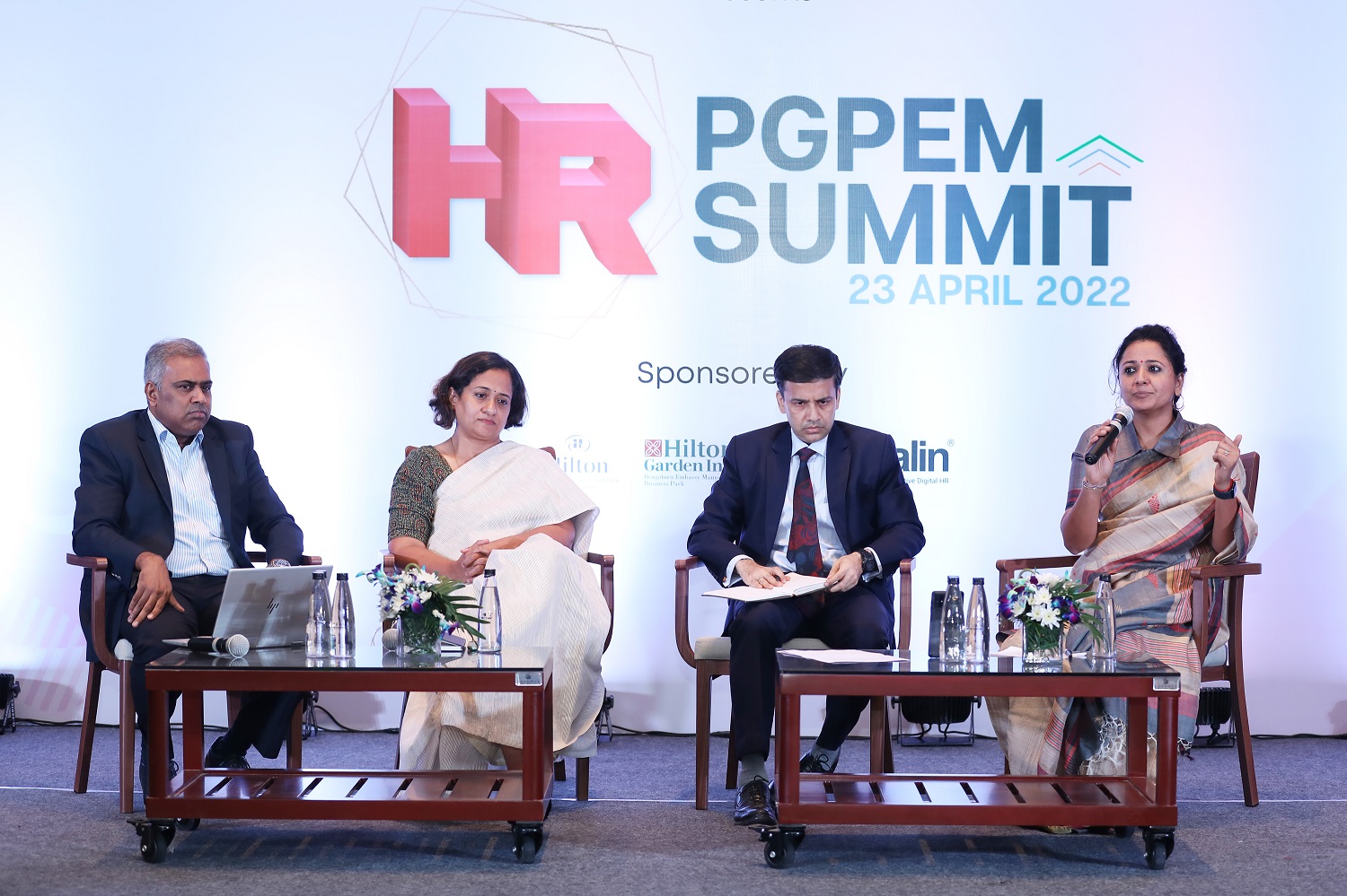 Shubhra Bhandari, HR Leader, Texas Instruments India speaks at the panel discussion on ‘Reinventing talent strategies for future - acquisition, development and retention’. (L-R) Ruben Selvadoray, Group Head - Talent Management; Sonia Kutty - Group HR Head - Quest Global & OD; Dr. Sourav Mukherji, faculty from the Organizational Behavior & Human Resources Management area, IIMB and Shubhra Bhandari.