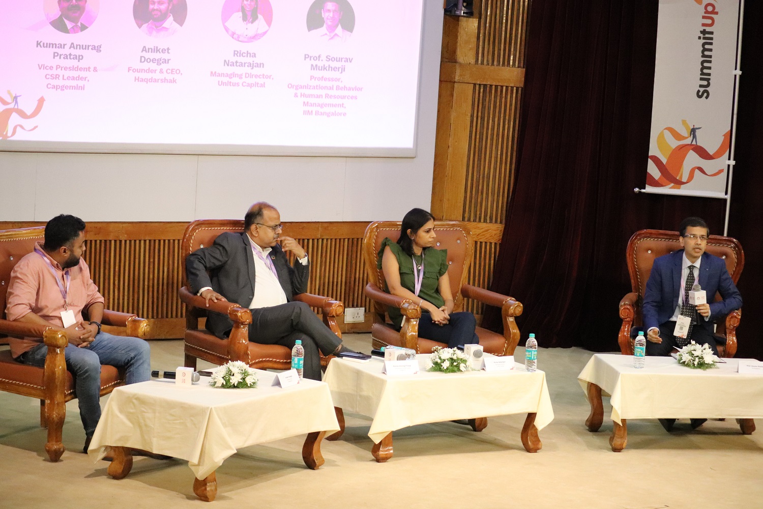 Kumar Anurag Pratap, Vice President and Corporate Social Responsibility Leader, Capgemini India; Aniket Doegar, Co-founder & CEO, Haqdarshak; Richa Natarajan, Managing Director, Unitus Capital and Prof. Sourav Mukherji, Dean, Alumni Relations & Development, IIMB at the panel discussion on ‘Is Tech living up to the expectation of impact innovation at scale?’.