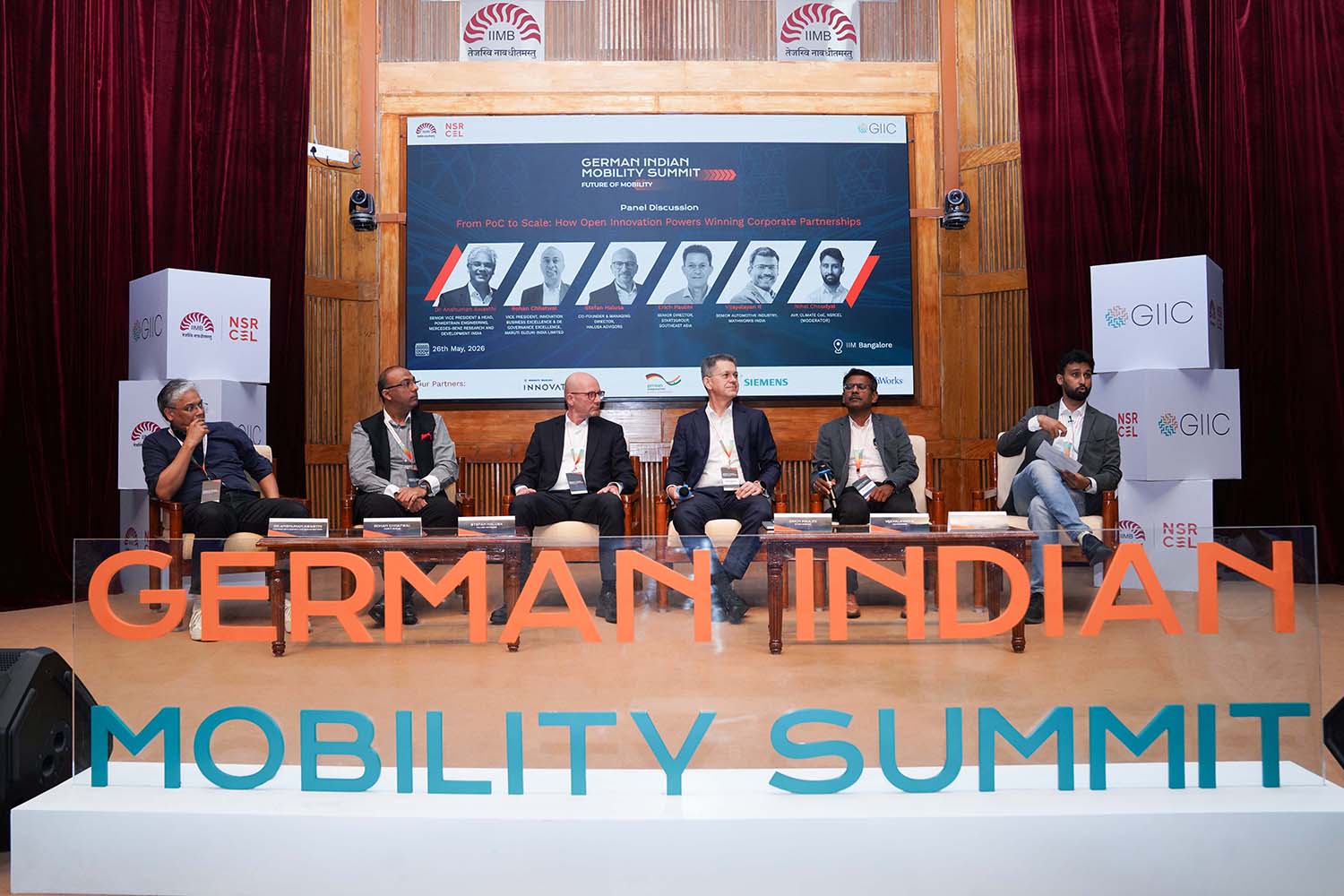 (L-R): Dr. Anshuman Awasthi, Senior Vice President & Head, Powertrain Engineering, Mercedes-Benz Research and Development India; Rohan Chhatwal, Vice President, Innovation Business Excellence & DE Governance Excellence, Maruti Suzuki India Limited; Stefan Halusa, Co-founder & MD, Halusa Advisors; Erich Paulini, Senior Director, Start2Group, Southeast Asia; Vijayalayan R, Senior Manager, Automotive Industry, MathWorks, and moderator Nihal Choudyal, AVP, Climate CoE, NSRCEL, IIM Bangalore, during a panel discussion on, ‘From PoC to Scale: How Open Innovation Powers Winning Corporate Partnerships’.