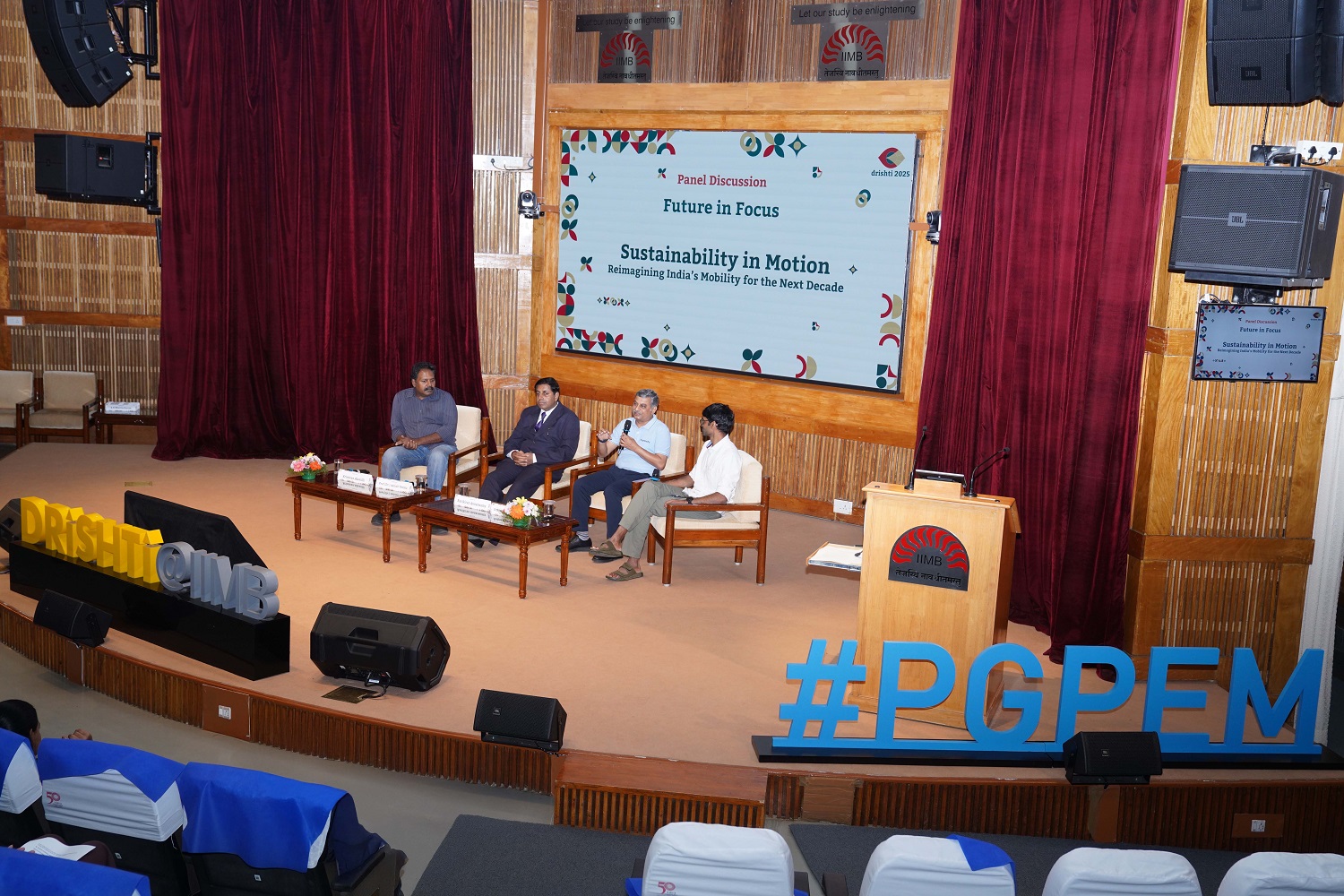 (L-R) Subject experts Srinivas Alavilli, Program Senior Fellow – Sustainable Cities and Transport, WRI India; Dr. Ashish Verma, Professor of Transportation Systems, IISc Bangalore; Ravikiran Annaswamy, CEO and Co-founder, Numocity Technologies, with PGPEM ’23 Shreyas Krishna Seethapathy, Ather Energy, reflected on India’s ‘aspirational’ mobility ownership patterns during the session ‘Sustainability in Motion – Reimagining India’s Mobility for the Next Decade’.