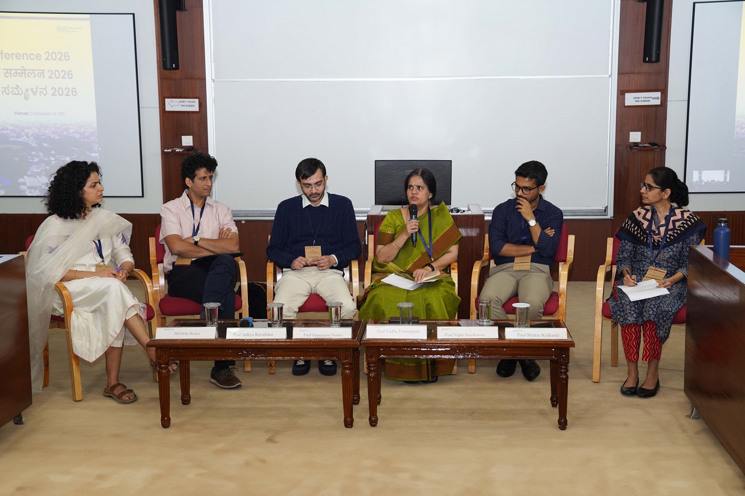 (L-R): Panelists Dr. Girija Borker, Research Economist, World Bank; Prof. Aditya Kuvalekar, University of Essex; Prof. Samarpan Nawn, IIM Udaipur; Prof. Vedha Ponnappan, IIM Udaipur, and Prof. Vipin Sreekumar, Masters’ Union School of Business, with moderator Prof. Mukta Kulkarni, Dean, Programmes, Chairperson, Office of International Affairs, and faculty of the Organizational Behavior & Human Resources Management area of IIMB, during a panel discussion on ‘Cracking the Code: How to Publish in Top-tier Journals’, at IMRDC 2026, on 9th January 2026.