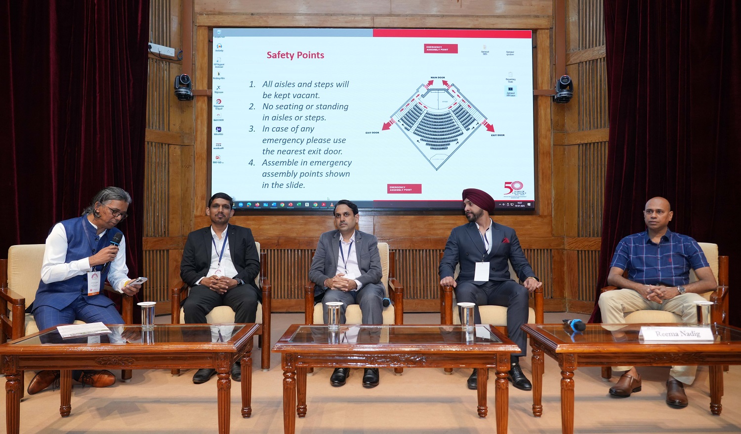(L-R) Dr. Amrut Kadam, Deputy Director, RGUHS; Prof. Shreevyas H M, Project Director, Centre for e -e-Governance, DPAR, GoK; Ajay Rungta, Startup Advisor & Angel Investor; Tejbir Singh, Founder & Managing Partner, T&R Law Offices, and Sathyanarayana B V, CEO, DERBI Foundation, at the SMartTANK IIMB startup showcase, where promising early-stage healthcare ventures pitched their ideas around AI diagnostics, accessibility, cost-reduction innovations, and green healthcare.