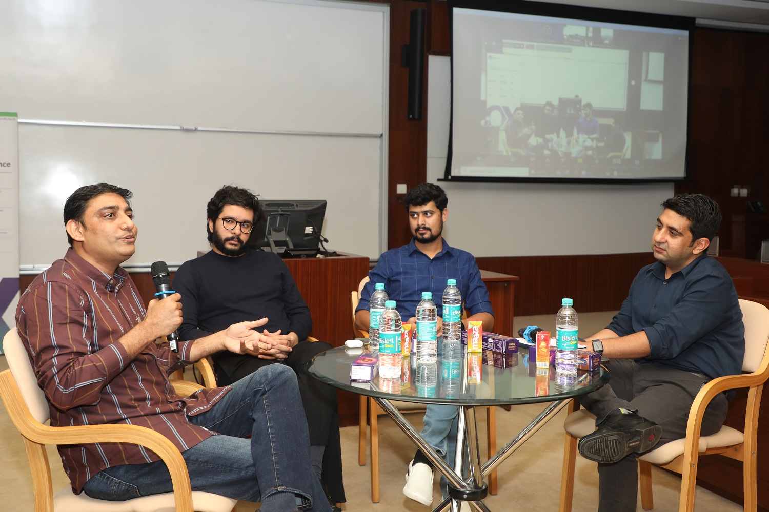 (L-R) Himanshu Doshi, Chief Product Officer, Servify; Akshay Hegde, Co-founder, ShakeDeal; Abhinav Pathak, Co-founder, Perpule, and Prof. Mayank Nagpal, faculty from the Marketing area, IIMB, at the panel discussion on: ‘Achieving Procurement Excellence and Re-innovating the Customer Shopping Experience’.