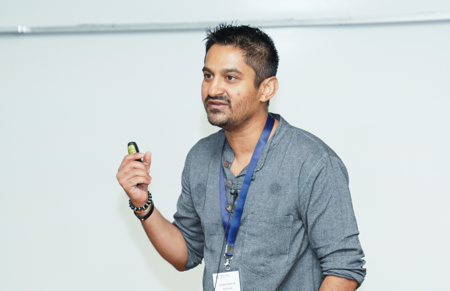 Prof. Arun Chandrasekhar of Stanford University delivers the keynote address on ‘Discovering what belongs in a story’, at the symposium on 29th August 2025.